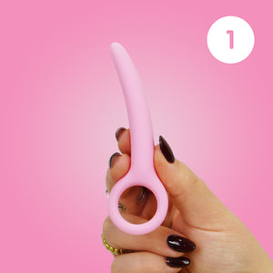 Woman hand holding a dilator from the Skins Care range