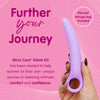 Hand holding up the medium purple dilator, next to text that states Further your Journey 